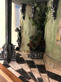 Sandy Edwards fantastic dragon house is unique, She uses my plasterwork so creatively